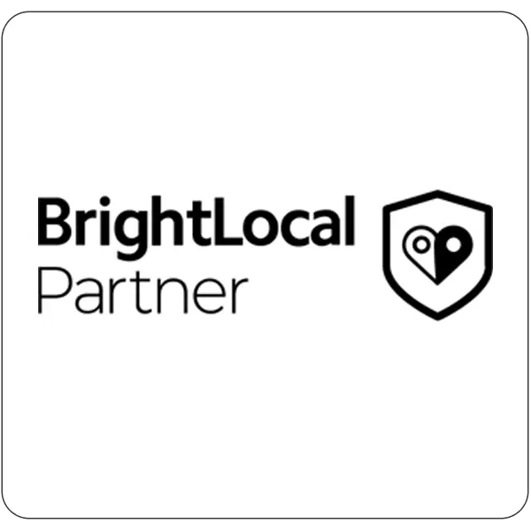 BrightLocal Partner logo with a shield emblem featuring a location pin inside the shield.